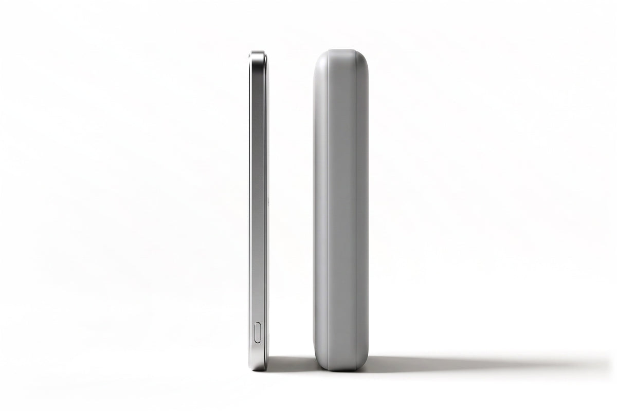 HELION AIR standing edge-on beside a thicker, generic power bank brick